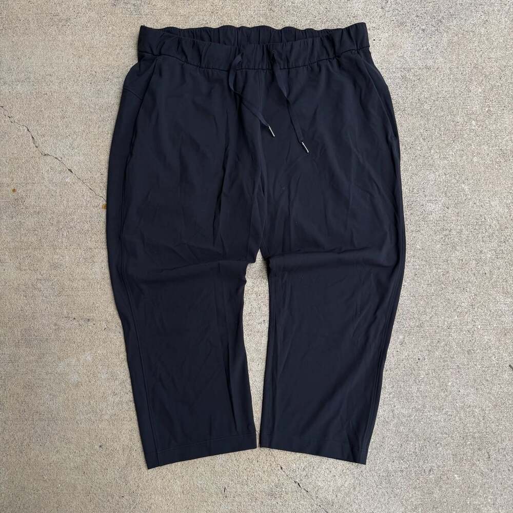 Lululemon On The Fly Woven 7/8 Tapered Travel Crop Pants Black Size 12